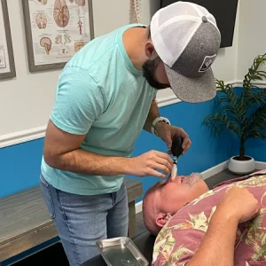 10 Reasons Why Hiring a Certified Chiropractor is So Important. Dr. Bain performs chiropractic endonasal correction on a surprise, az patient.
